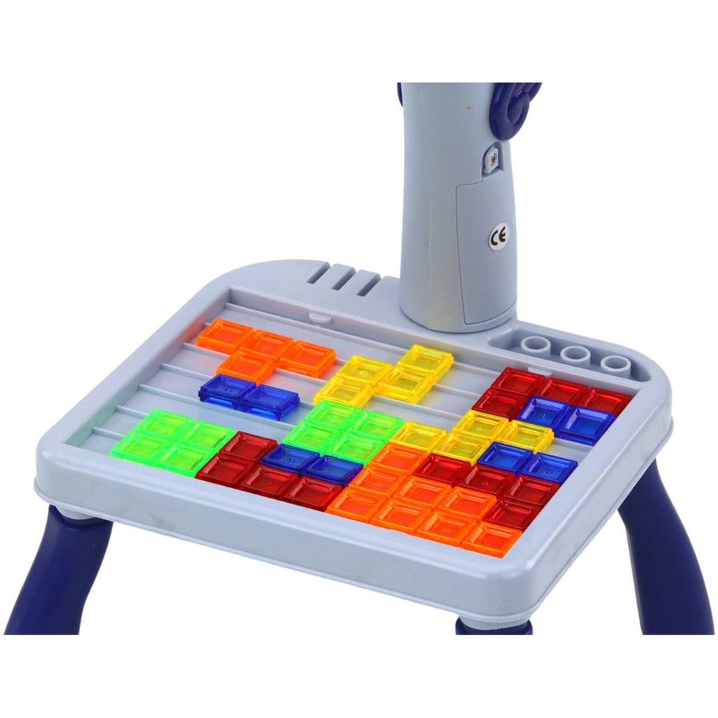 2 in 1 Projector - Blauw with colorful shape puzzle blocks on a white and blue tray for creative play.